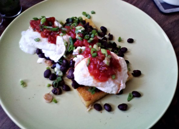 I made cornmeal cakes from FSC book club selection and topped them with poached eggs, black beans, salsa and fresh green onions. 